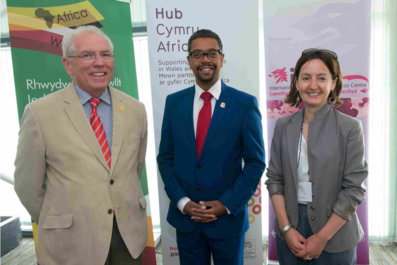 Tony Jewell (Wales for Africa Health Links Network), Vaughan Gething (Cabinet Secretary for Health, Wellbeing and Sport) and Cat Jones (Hub Cymru Africa)