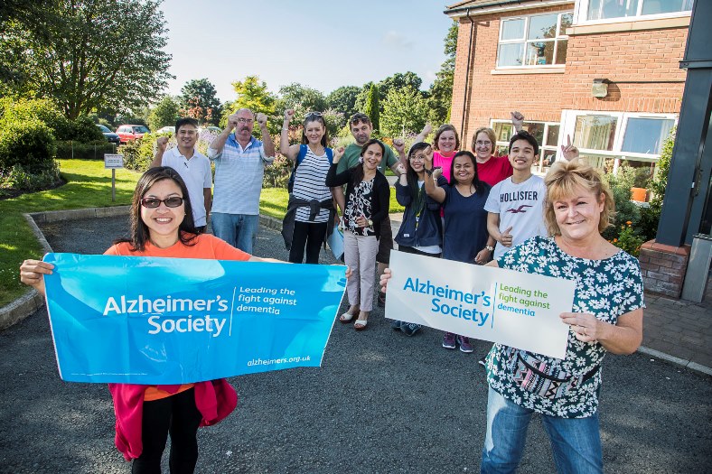 Staff from Bodlondeb who took part in a ten mile sponsored walk around Llyn Brenig in aid of Alzheimer's Society and  the residents fund. Organisers Olga Azarcon, left and Susan Craig lead the way.