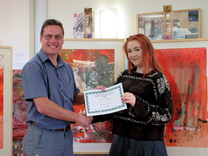 Kimberley Barker and CAVC Public Services Course Leader Gary Pedder presenting her with a certificate and cheque for £100