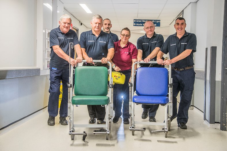 The porters team at Ysbyty Glan Clwyd nominated for an award at the Betsi Cadwaladr University Health Board staff awards. From left, Paul Rowlands, Phil Davies, Debbie Blackburn with the grab bag, Pete Blythin, Wayne Davies and Rhys Davies.