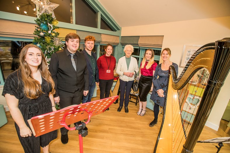 Bryn Seiont Christmas Concert with the resident musician Nia Davies Williams performing with students from Bangor University's School of Music. From left, Seren Haf, Daffydd Aled, Caleb Rhys, Gwawr ifan, resident Daphne Egan, Lowri Elen and Nia Willais davies