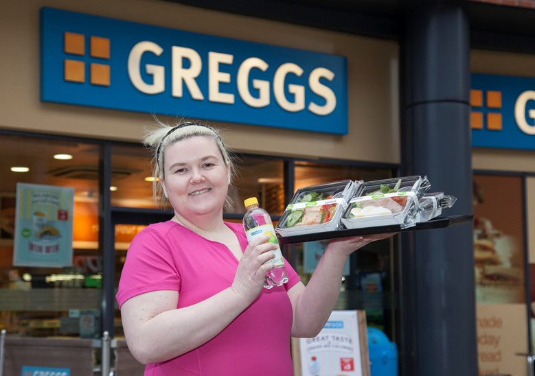 The Manger at Greggs in Eagles Meadow in Wrexham has lost 5 stone weight lifting and is aiming to lose more and participate in weight lifting competitions. Pictured: Nerys Jones outside the store where she works